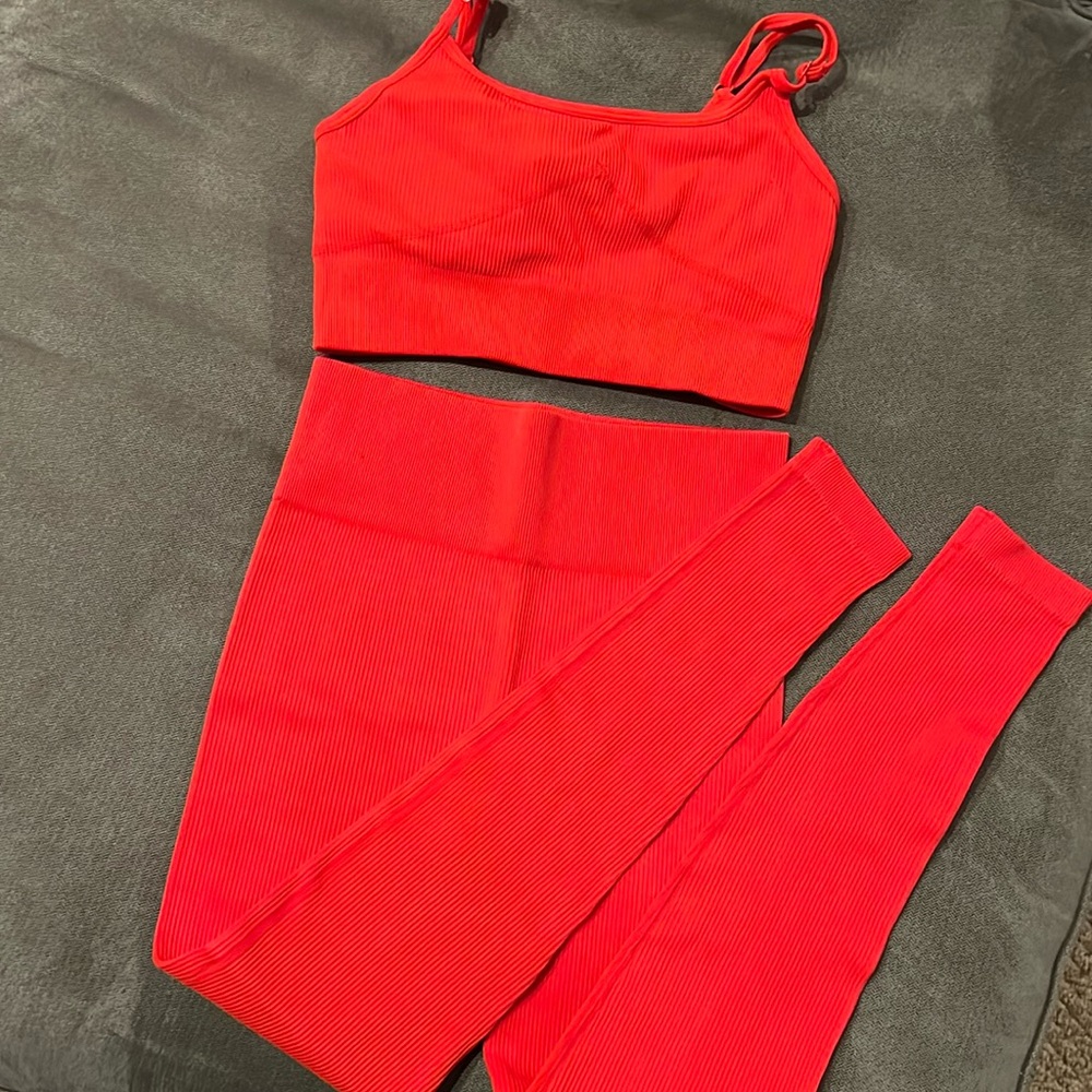 Two piece athletic red bralette and leggings